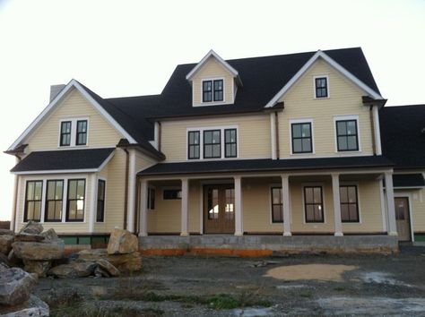 yellow house + white trim + black windows House Exterior Black Windows, Black Windows White Trim, Exterior Black Windows, House Exterior Black, Best House Paint Colors, White House Black Windows, Black Windows Exterior, Yellow House Exterior, Farmhouse Inn