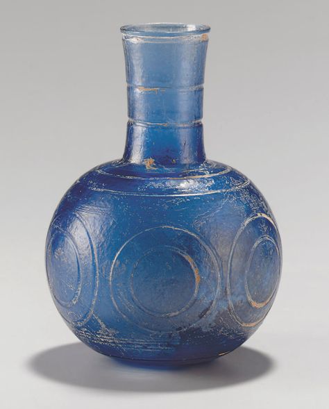 A LATE ROMAN GLASS BOTTLE Eros And Psyche, Eastern Mediterranean, Pottery Inspo, Antique Glass Bottles, Egyptian Artifacts, Glass Rocks, Ancient Roman Glass, Glass Inspiration, Roman Glass