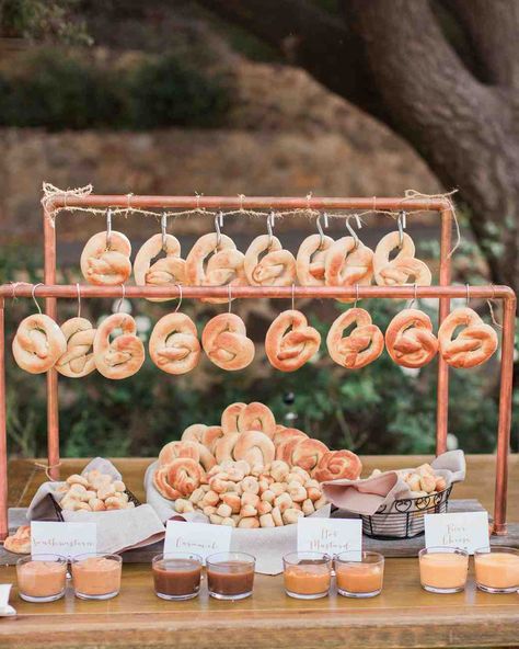 25 Cocktail Hour Ideas from Real Weddings | Martha Stewart Weddings - Assorted dipping sauces accompanied freshly-baked pretzels at this creative food station. #cocktailhour #weddinginspiration #weddingfood Reception Food Station, Wedding Reception Food Stations, Katering Pernikahan, Unique Wedding Food, Wedding Food Bars, Party Food Bars, Pretzel Bars, Wedding Food Stations, Graduation Party Foods