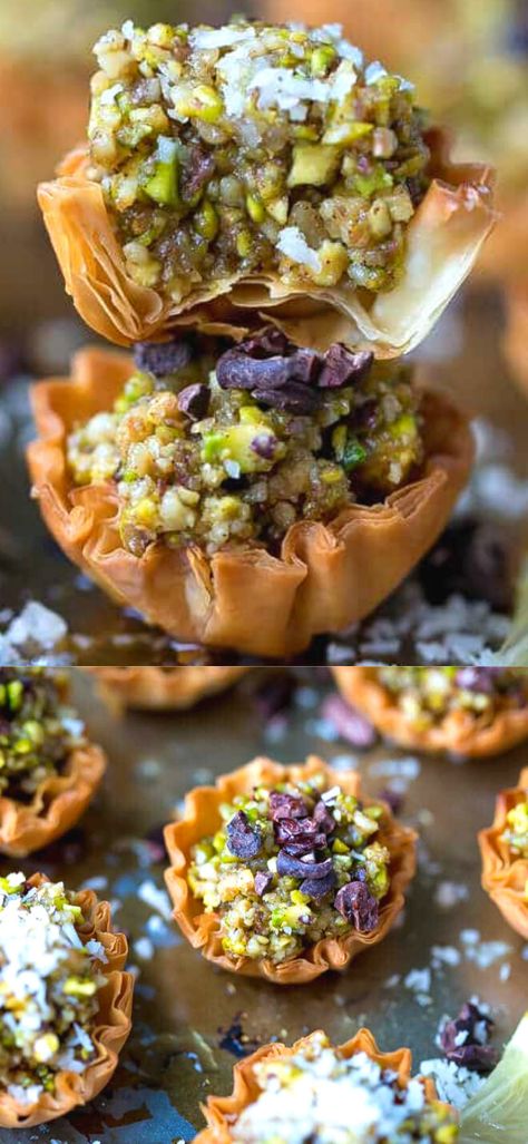 Mini Phyllo Baklava Cups Recipe – flakey, sweet and delicious, these mini bites are great for a party or celebration. A mini version of a popular Middle Eastern dessert. Middle Eastern Christmas Recipes, Middle East Dessert Recipes, Middle Eastern Party Food Ideas, Persian Baklava Recipe, Middle Eastern Party Food, Middle Eastern Party, Middle Eastern Recipes Desserts, Arabic Deserts Recipes, Middle East Dessert