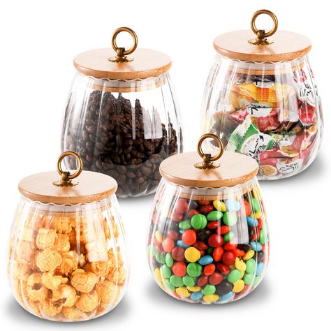 PRICES MAY VARY. Package Includes: 4 Pieces of petal glass canister with bamboo lid metal handle. Dimensions :4.5"D * 4.7"H; Opening for Jar: 3.3"; Capacity: 25 oz: Weight: 232g. An over-valued kit, enough quantity to meet your daily needs Premium Quality: The glass storage jars are made of high borosilicate glass with an airtight lid and a metal handle, 100% lead-free, non-toxic, sturdy and durable. Oval and wide-mouth design allows for easy filling, removing and cleaning, great for daily use A Tea Cookie, Cheap Candy, Flour Container, Dried Lavender Flowers, Airtight Storage, Kitchen Jars, Jar Storage, Glass Storage Jars, Airtight Food Storage