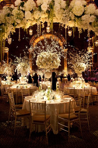 With an all-white color palette, these over-the-top centerpieces exude a luxurious vibe. Winter Wedding Venues, Tafel Decor, White Wedding Flowers, Deco Floral, Wedding Moments, Fairytale Wedding, Wedding Planners, Wedding Themes, Reception Decorations