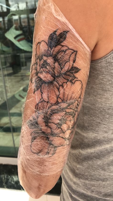 Flower Tattoo On Tricep, Flower Tricep Tattoo Women, Tattoo Of Flowers On Arm, Women’s Tricep Tattoo, Floral Tricep Tattoo, Peony Arm Sleeve, Tricep Flower Tattoo Women, Peonies Sleeve Tattoo, Peony Tattoo On Arm