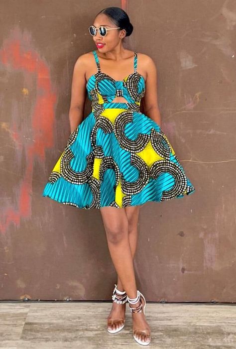 Feeling Tuesday blue never looked so good. A simple style to bring out the freedom in you 💙 #CassisCreations #StyleOnPoint #CassisDesigns #fashion #fashiondesigner #fashiondesign #fashionstyle #africanprint #ghana #ghanaian Simple Chitenge Dress, Kitenge Dress Designs, Chitenge Dresses, African Dress Patterns, Chitenge Outfits, Fancy Short Dresses, African Fabric Dress, African Print Dress Ankara, Short African Dresses