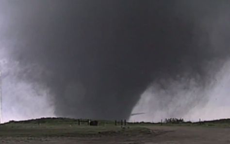 Nearing peak intensity, the tornado ground its way into Double Creek Estates. A horizontal vortex tube, fairly common in extremely intense tornadoes, can be seen near the bottom. Texas Tornado, Tornado Pictures, Tornado Damage, Tornado Alley, Texas Weather, Storm Chasing, Wild Weather, Mountain Stream, Weather And Climate