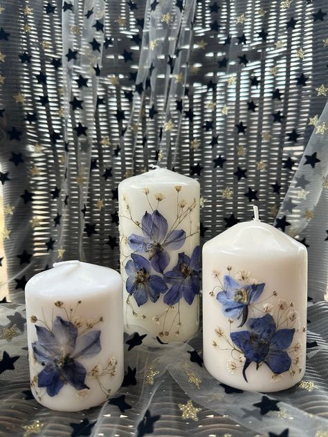 Dark blue Delphinium's and delicate white Baby's Breath make up these pretty candles Flowers on front and back of candles, see in pictures.  Comes gift wrapped in tissue and white box  Can be gift messaged I burn my candles and I have found them to be safe. Please follow instructions given on the Candle. To make your candles last well keep them away from strong light. Just like paintings fade with time and have to be protected from sunlight so do pressed flower candles. https://mehreensmedley.etsy.com Pressed Flower Candles, Pretty Candles, Flower Candles, Candles Flowers, Flowers Candles, Blue Delphinium, Pretty Candle, Floral Candle, Aesthetic Candles