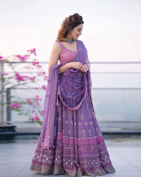 @nargisfakhri looks enchanting in ‘Ayat’ - our handcrafted lehenga in a mesmerising lilac palette. To find the perfect ensemble for… Lilac Lehenga, Purple Lehenga, Lehnga Dress, Punjabi Outfits, Indian Photoshoot, Indian Dresses Traditional, Party Wear Indian Dresses, Stylish Sarees, Indian Wedding Outfits