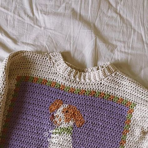 anneli xie & aleksander jaworowski on Instagram: "I heard you all! by popular request, the BEAN SWEATER is now available as a crochet pattern! and it’s GRADED, meaning no maths!!! go grab it on our website or on etsy. 🫘🐶🐕🐩🦮🐕‍🦺❤️ this is a sweater pattern featuring six graphs of our dog Luna and all of her bestest friends, with ample opportunities to modify the graphs to crochet a tapestry based off of your own dog.  the back of the sweater features Luna’s favorite toys – and you are of course welcome to modify them to fit your dog’s mood. the pattern is suitable for advanced beginners and up. link in bio! <3 #beansweater #crochet #crocheting #crochetinspiration #crochetlove #crochetaddict #crochetersofinstagram #crochetsweater" Crochet Sweater Graph Pattern, Crochet Sweater Tapestry, Crochet Tapestry Sweater, Tapestry Crochet Sweater, Tapestry Sweater, Crochet Design Pattern, Crochet Tapestry, Crochet Design, Crochet Dog