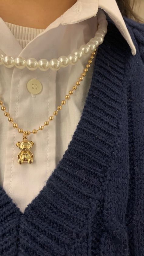 Teddy Bear Necklace Classic Aesthetic UGC and pearl necklace with a blue and withe outfit jewel UGC content Cute Pjs Aesthetic, Pearl Necklace Aesthetic, Teddy Bear Necklace, Brandy Melville Jewelry, Ugc Content, Teddy Bear Clothes, Cute Pjs, Classic Aesthetic, Bear Necklace