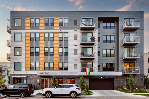 Striking Facades Transform Low- and Mid-Rise Apartments into Urban Showpieces | Architect Magazine Mid Rise Apartment, Low Rise Building, Low Rise Apartment, Standing Seam Roof, Architect Magazine, Cladding Systems, Metal Cladding, Ribbed Paneling, Apartment Buildings