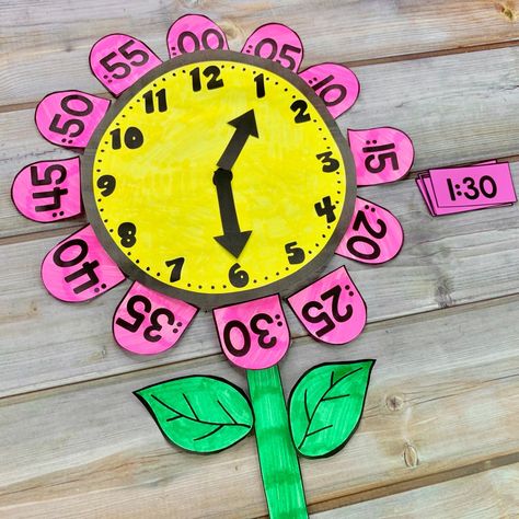 This 13 page Telling Time FREEBIE includes templates to create this cute flower craft clock. What a wonderful way for your kindergarten, first, second, or third grade elementary students to get hands-on practice telling time with an analog clock. Can be used in small groups, math centers, independent practice or guided math time! Perfect for kindergarten, first, second, or third grade students. Flower Clock For Classroom, Art Jamming Ideas, 2nd Grade Crafts, 1st Grade Crafts, 2nd Grade Activities, Clock Craft, Clock Flower, Flower Clock, Teaching Second Grade