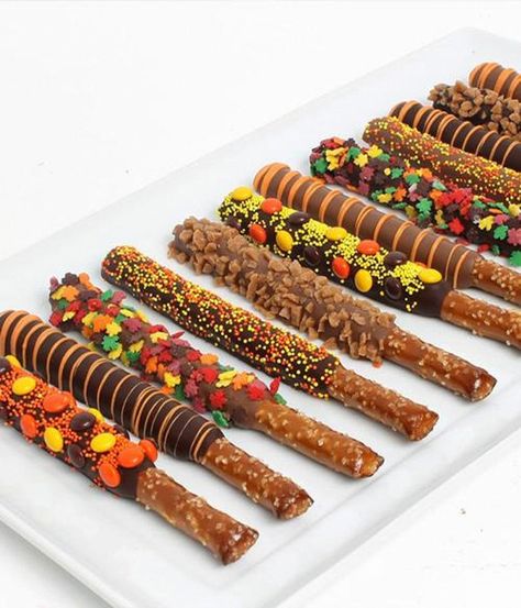 #pretzelchocolate Pretzel Chocolate, Thanksgiving Chocolates, Christmas Pretzels, Dipped Pretzels, Thanksgiving Snacks, Chocolate Covered Pretzel Rods, Chocolate Dipped Pretzels, Pretzel Dip, Covered Pretzels