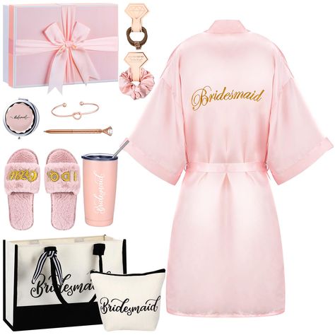 PRICES MAY VARY. Nice Matching Set: you will receive 14 pcs bridesmaid gifts including a short satin robe, a bridesmaid tote bag and a makeup bag, a pair of bridesmaids wedding slippers, a bridesmaid gift box with 10g raffia, a stainless steel vacuum cup, 2 pink coil hair ties, 3 rib woven hand ropes, a rose gold bangle, a diamond pen and a makeup mirror Ideal bridesmaid Gifts: the short satin robe, tote bag, makeup bag, stainless steel vacuum cup and makeup mirror are printed the words [bridesm Bachorlette Gift Baskets, Bridal Bags For Wedding Day, Wedding Bridesmaid Proposal Gift Ideas, Cute Bridesmaid Gifts, Wedding Bridesmaid Gift Ideas, Bride To Be Accessories, What To Put In A Bridesmaid Gift Boxes, Bridesmaids Day Of Gifts, Bridesmaid Gifts Day Of Wedding