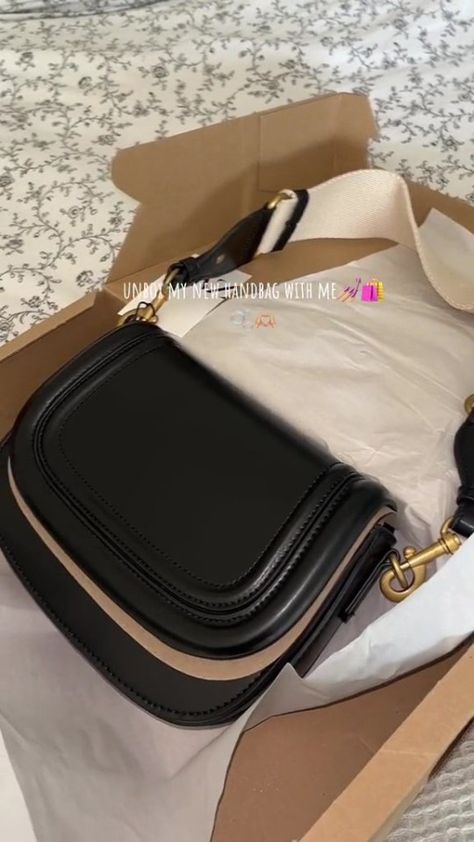 ZARA fans are in a frenzy over a stunning black handbag with a major perk. The retailer has released a gorgeous little black handbag for every occasion, which comes with one special feature. Taking to TikTok, user Eilis Marron shared a short video to the platform showing off the new find. The caption on the […] Zara Bags, Black Handbag, Go Wild, Going On Holiday, New Handbags, Black Handbags, Cotton Bag, Short Video, Personal Touch