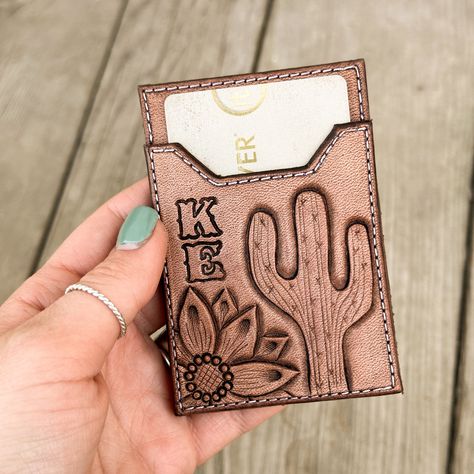 This wallet is designed to attach to the back of your phone or phone case to keep your cards, cash & ID all in one place.  Wallets come in one standard size that fits all larger phones. They measure 3 7/8 inches tall by 2 5/8 inches wide.  This item is handmade each time an order is placed, so the finished product may vary slightly from the photo.