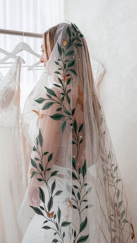 Rue De Seine Wedding Dresses | AN ICON 🕊 The details of our Mountain Song veil are unmatched. Embroidered leaves creep up the sides with intricately stitched birds… | Instagram Embroidered Vines Wedding Dress, Rue De Seine Mountain Song Veil, Leaf Embroidered Wedding Dress, Wedding Dresses With Leaves, Veil With Leaves, Flower Embroidered Wedding Veil, Bird Wedding Dress, Mexican Wedding Veil, Colorful Veil Wedding