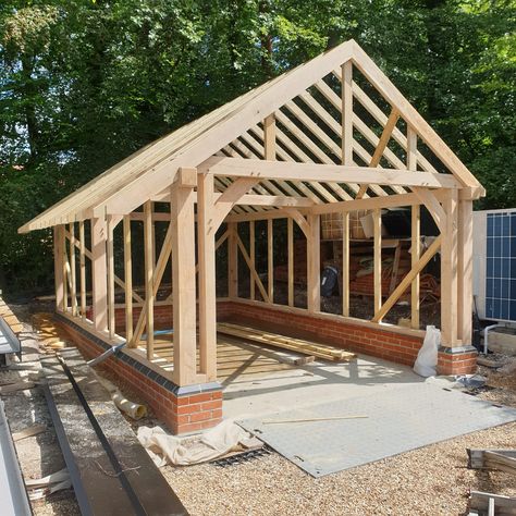 A 1 bay oak framed garage just installed. The client will be doing the cladding and roofing to match the existing property as requested. We are happy to work with our clients if there are certain aspects of a project they would rather do themselves. #oak #oakgarages #garages #gardendesign #homeimprovements #oakframing #greenoak #carpentry #southeast #UK #Surrey Oak Frame Garage, Oak Framed Garage, Timber Frame Garage, House Framing, Timber Garage, Garden Garage, Underground Homes, Shed Doors, Backyard Pavilion