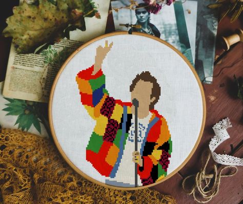 "Hi there Harry Styles fans! Harry Styles colourful cardigan Cross stitch pattern - embroidery design This is a digital item. The PDF file of the pattern will be available for instant download once payment is confirmed. No fabric, floss or other materials are included. This pattern uses 15 coloUrs and is 79 stitches wide and 117 stitches tall. On 14 count aida this will measure 5.6 inches x 8.4 inches.  PDF FILE INCLUDES: - Pattern in colors on 1 sheet; - Pattern in symbols on 1 sheet; - Pattern in color and symbols on 1 sheet; - List of DMC thread colours HOW TO DOWNLOAD PATTERN Etsy will send you an email with a link to the download page. You can also access to your digital files going to your profile, then \"Purchases and reviews\", find your order, there is the link as well. You will n Harry Styles Cross Stitch, Harry Styles Gift Ideas, Colourful Cardigan, Pattern Embroidery Design, Colored Cardigans, Pattern Embroidery, Dmc Thread, Style Gift, Cross Stitch Pattern