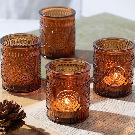 PRICES MAY VARY. Decoration and Gift: glass votive candle holders are very good decorations for weddings and festivals. Vintage candle holders add character to your setting. Candle holders can also be given to your relatives and friends as gifts, they will be very happy. Appearance: The surface of the brown candle holder is engraved with dots, stripes and sunflower patterns, which looks full of vintage flavor; amber light shines out to make your small candle holder more unique, and it is very co Gold Votive Candle Holders, Gold Votive Candles, Brown Candles, Table Centerpieces For Home, Small Candle Holders, Glass Votive Candle Holders, Glass Candlestick Holders, Votive Candle Holder, Boho Wedding Decorations