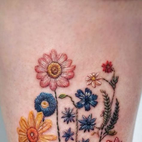 ᴇᴅᴍᴏɴᴛᴏɴ ᴛᴀᴛᴛᴏᴏ on Instagram: "Embroidery wild flowers🌷🌻🌼
.
.
.
.
.
.
.
.
.
.
#edmontontattoo #yegtattkk #yyctattoo #calgarytattoo #reddeertattoo #embroideryflowers #embroiderytattoo #embroideryart #wildflowertattoo  #flowertattoo #yegcolortattoo" Embroidery Tattoo Flower, Embroidered Tattoo Design, German Flower Tattoo, Embroidery Flower Tattoo, Embroidery Wild Flowers, Embroidery Tattoo Ideas, Cutesy Tattoos, February Flower Tattoo, Wild Flower Tattoo