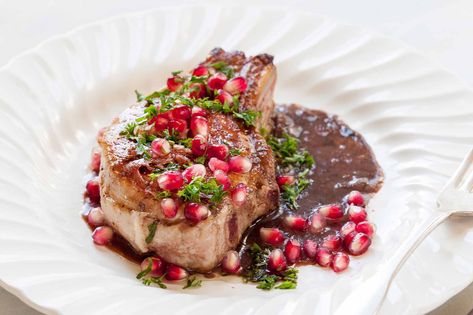 Pan-seared pork chops with a quick pomegranate juice glaze. Top with pomegranate seeds and parsley. 30 minutes to make. Pomegranate Glaze, Pan Seared Pork Chops, Best Pork Recipe, Pomegranate Recipes, Seared Pork Chops, Pork Schnitzel, Glazed Pork Chops, Cherry Sauce, Pork Glaze