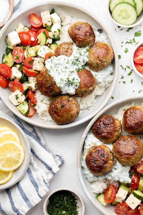 If you want to enjoy the delicious and healthy flavors of the Mediterranean, try making some Greek turkey meatballs! This recipe is absolutely delicious and really easy to make. Served up with a homemade tzatziki sauce, this meal is perfect for meal prep bowls or salads. Greek Turkey Meatballs With Tzatziki Sauce, Tzatziki Meal Ideas, Mediterranean Meatball Bowl, Mediterranean Turkey Bowl, Greek Turkey Meatball Bowls, Greek Meal Prep Bowls, Meal Prep Meatballs, Greek Meatballs With Tzatziki Sauce, Greek Buffet