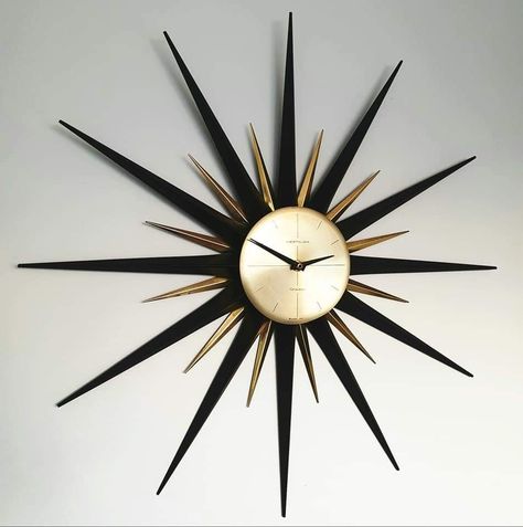 Westclox Granby starburst clock  photo Damien West Cabin Porch Ideas, Mcm Living Room, Starburst Clock, Mcm Living, Sunburst Clock, Cabin Porch, Night Sky Photography, Exterior Decoration, Clock Wall