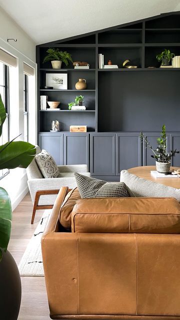 Simple Wall Bookshelves, Dark Grey Built In Bookcase, Dark Color Bookshelves, Dark Painted Built In Bookshelves, Dark Painted Bookshelves, Bookshelf Accent Wall Bedroom, Painted Built In Shelves Living Room, Shelves Painted Same Color As Wall, Painted Bookshelf Wall