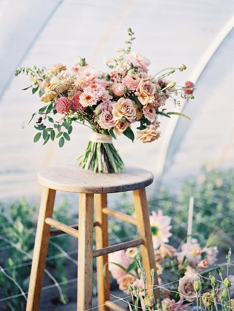 Such beautiful gestures in this bouquet of dusty pinks, corals, and mauves. Erin Benzakein, Neutral Bouquet, Bouquet Styles, Yellow Bridal Bouquets, Flower Farms, Orange Bouquet, A Bunch Of Flowers, Organic Wedding, Pink Wedding Flowers