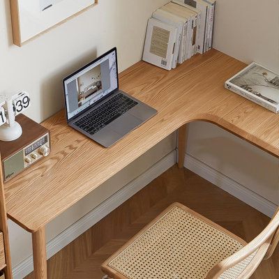 Maximize your workspace with our all-wood corner desk. Efficiently utilizing your home's 90° corners, it offers expanded desktop space. Featuring an L-shaped design with a built-in cable hole and under-desk metal cable organizer, it keeps your workspace tidy. Sturdy, with wide-set legs and reinforcing crossbars, it's both stable and durable. Rounded edges ensure safety and comfort. Elevate your work experience with this sleek and functional desk. Size: 29.72" H x 51.18" W x 15.75" D | Orren Elli Wood Corner Desk, Solid Wood Writing Desk, Tiny Office, Corner Office, Functional Desk, Office Guest Room, Solid Wood Desk, Metal Desks, L Shaped Desk