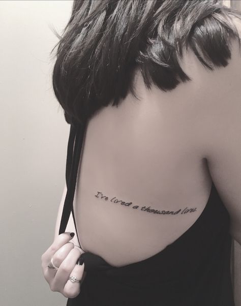 I've lived a thousand lives. #tattoo #reading #back #side Ive Lived A Thousand Lives Book Tattoo, Ive Lived A Thousand Lives Tattoo, I've Lived A Thousand Lives Tattoo, I Have Lived A Thousand Lives Quotes, Lived A Thousand Lives Tattoo, I Have Lived A Thousand Lives Tattoo, Book Quotes Tattoo, Book Castle, Book Inspired Tattoos