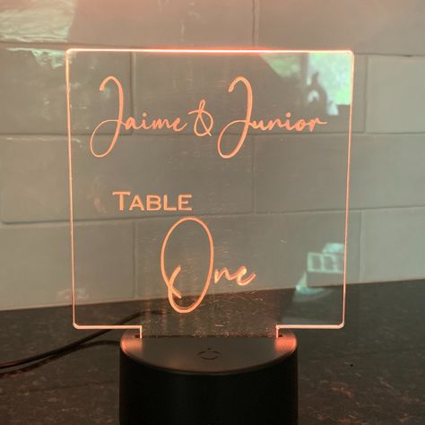 💍 Illuminate Your Reception with Custom LED Table Numbers! 💍 Laser-engraved acrylic wedding table number signs with multiple color LED bases – the perfect blend of elegance and modernity for your special day. ✨ ✨ Features: Personalized laser engraving Multiple color LED base Stylish and durable acrylic design Make your wedding reception unforgettable.🌟 #CustomWeddingDecor #CustomWeddingSigns #LightUpWeddingSigns #CustomWeddingTableNumbers #CustomWedding #PersonalizedWeddingSigns Table Number Signs, Wedding Table Number Signs, Custom Wedding Decor, Laser Engraved Acrylic, Number Signs, Acrylic Design, Wedding Table Number, Custom Wedding Signs, Acrylic Wedding