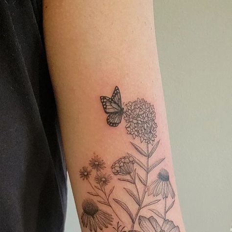 Sarah Seveney on Instagram: "Wildflower inner arm tattoo for @ameseck22, thank you Amy! Milkweed, blue aster, cosmos, and coneflowers, as well as a little butterfly, are all incorporated in this piece...floral tattoos forever ❤️ #butterflytattoo #flowertattoo  #travelingtattooartist  #blackandgreytattoos" Mn Wildflowers Tattoo, Milkweed Plant Tattoo, Wildflower Garden Tattoo, Butterfly Milkweed Tattoo, Garden Flower Tattoo, Wildflower And Butterfly Tattoo, Butterfly Bush Tattoo, Midwest Tattoo, Milkweed Tattoo