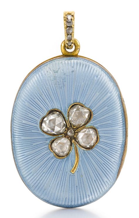 A FABERGÉ JEWELLED SILVER-GILT AND GUILLOCHÉ ENAMEL LOCKET, WORKMASTER AUGUST HOLLMING, ST PETERSBURG, 1899-1903 oval, enamelled in translucent sky blue over a radiating engine turned ground, applied with a diamond-set four leaf clover, rose-cut diamond-set loop, struck inside with workmaster's initials, 88 standardheight 3.6cm, 1⅜in. Faberge Jewelry, Enamel Locket, Jewelry Lockets, Four Leaf, Diamond Set, Enamel Jewelry, Leaf Clover, Four Leaf Clover, Antique Jewellery