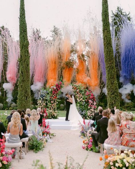 FLORAISON on Instagram: "Saskia & Freddie’s wedding was a burst of vibrant colors, set against the lush greenery backdrop of this picturesque region, Provence🌻 We absolutely loved working with these colorful flowers! Wedding Planner & designer @camilledelucasignature Photographer: @maddy.christina.photo Venue: @chateaudestoublon et @aurelien.guery Floral designer: @floraisonparis Videographer: @mgimage Production: @decoflamme Officiant: @celebrantinparis Daytime Fireworks: @jokerartifices Wedd Colorful Flowers Wedding, Wedding Cermony, Greenery Backdrop, Wedding Fireworks, Florence Wedding, Wedding Entrance Decor, Como Wedding, Wedding Stage Design, Dream Wedding Decorations