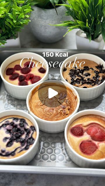 Aathira Sethumadhavan on Instagram: "First cheesecake. Then everything else. 😋
Healthier Cheesecake (150 Kcal per Cheesecake cup - not including the toppings)
Ingredients 
1/2 cup cream cheese 
1/2 cup thick hing curd or Greek Yoghurt (can also use 1/4 cup mascarpone cheese and 1/4 cup Greek yoghurt to improve the texture)
1 egg 
2 soaked dates (can also use honey/sweetener of choice)
1.5 tbsp cornflour 
1 tsp vanilla 
1/2 cup skim milk 
Toppings - 
Fresh/frozen Berries/chocolate chips/peanut butter 
Crumbled Marie/any biscuits to finish it off 

Method
1. Blend together all ingredients as shown.
2. Divide equally into 5 greased ramekins. 
3. Add in toppings of choice - personal favourite was Choco chips and frozen raspberries. 
4. Bake in a water bath (place the ramekins in a large dish, Healthier Cheesecake, Ramekin Dessert, Healthy Cheesecake, Cheesecake Cups, Frozen Raspberries, Frozen Berries, Choco Chips, Mascarpone Cheese, Skim Milk