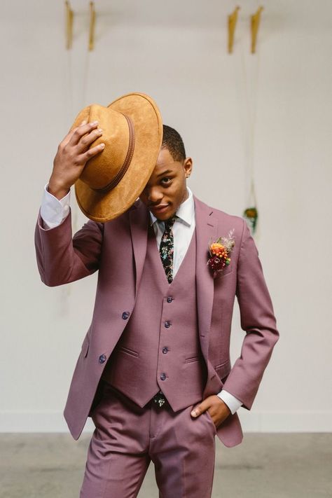 black groom wedding second space dapper purple suit inspiration flatlay rim hat florals tie black Man Purple Suit Groomsmen, Colorful Mens Suits Wedding, Purple Grooms Suit, Plum Mens Suit Wedding, Black Man Wedding Suit, Plum Wedding Suit, Groom Colored Suit, Purple Suit Men Wedding, Plum Groom Suit