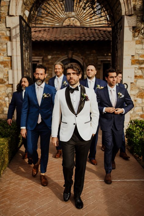 Walking Pose: Have the groom and his groomsmen walk towards the camera or away from it. This can create a more natural and candid look for the photo. Visit blog for more ideas Wedding Photos | Groomsmen Photography | Wedding Photographer. #groom'sphotography #destinationwedding #weddingstyle #californiawedding Pre Wedding Groomsmen Photos, Groomsmen Poses Wedding Photography, Bridesmaids Groomsmen Photos, Groomsmen Walk Up Photos, Groom Sitting Poses, Photographer Attire, Groomsman Photo Ideas, Grooms Poses, Groomsmen Photoshoot