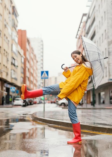 Woman with umbrella standing in the rain... | Free Photo #Freepik #freephoto #woman Woman With Umbrella, Umbrella Photo, Standing In The Rain, Rainy City, Vista Frontal, Happy Gif, Dance With You, Splash Of Color, Sketch Inspiration