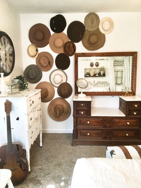 Hat Wall Display Over Bed, Boho Hat Wall Living Room, Hat Wall Display Bedrooms Hanging, Hat Decor Wall, Hat On Wall Bedroom, Diy Staging Wall, Western Hat Display, Western Hat Wall Display, Hats On Wall Display Bedroom