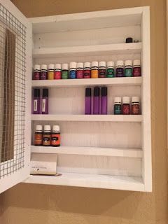 All Things Harrigan: DIY Essential Oil Storage Cabinet Essential Oil Cabinet Storage, Hall Linen Closet, Wall Organizer Diy, Essential Oil Starter Kit, Diy Essentials, Essential Oil Storage, Oil Storage, Storage Buckets, Diy Essential Oils