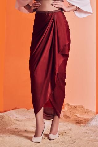 Shop for S&N by Shantnu Nikhil Maroon Poly Jersey Asymmetric Draped Skirt for Women Online at Aza Fashions Blouse Draping Pattern, Maroon Summer Dress, Draped Skirt Outfit Western, Skirts For Hip Dips, Cowl Skirt Draping, Skirt Draping Pattern, Wrap Drape Skirt Pattern, How To Make Drape Skirt, Cocktail Skirt Outfit