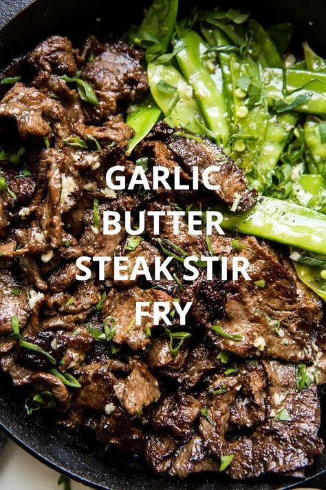 This steak stir-fry with a savory garlic-and-butter sauce feels indulgent, and is so easy to make. Served on its own or with rice, it’s the perfect quick weeknight dinner. #food #worksheets #kids Stir Fry With Snow Peas, Steak Stirfry Recipes, Stir Fry Meat, Strip Steak Recipe, Steak Stir Fry, Fried Steak Recipes, Steak And Rice, Beef Stir Fry Recipes, Easy Stir Fry Recipes