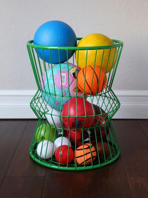 ...balls and toys. This piece adds a unique touch to your living space and keeps the toys together. Modern Kids Playroom, Wooden Storage Bins, Kids Playroom Storage, Playroom Storage Ideas, Playhouse Interior, Playroom Table, Kids Playroom Art, Kids Toy Organization, Ball Storage