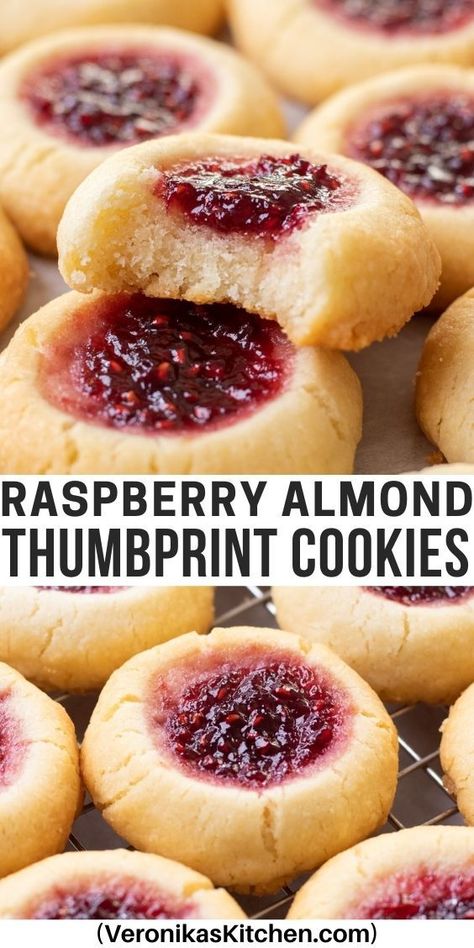 Thumbprint cookies, filled with raspberry jam. Almond Burst Cookies, Land O Lakes Raspberry Thumbprints, Jam Thumb Print Cookies Recipes, Almond Jam Cookies, Shortbread Cookies With Raspberry Jam, Raspberry Jam Thumbprint Cookies, Recipes Using Raspberry Preserves, Raspberry Shortbread Cookies Recipes, Raspberry Drop Cookies