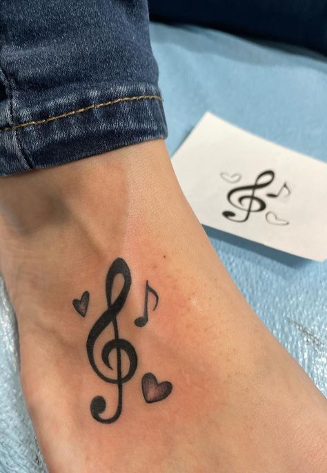 Music Note With Rose Tattoo, Women Music Tattoos, Music Lovers Tattoo Ideas, Treble And Bass Clef Tattoo, Tatoos Woman Ideas, Music Sleeve Tattoo Women, Musical Tattoos For Women, Tattoo With Music Notes, Tattoos Of Music