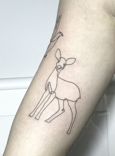 Single line tattoo of a dear Deer Line Tattoo, Doe Tattoo Simple, Dear Tattoos, Simple Deer Tattoo, Small Deer Tattoo, Deer Outline, Antler Tattoo, Doe Tattoo, Deer Tattoo Designs