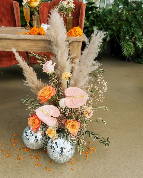 A groovy disco themed wedding in Grand Rapids, MI Mary Shelton Photo Western Disco Decor, Disco Floral Arrangements, 70s Bride, Disco Themed Wedding, Groovy Wedding, Disco Ball Decorations, Disco Wedding, Fall Ball, Wooden Arch