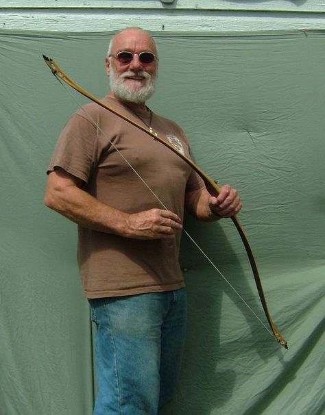 Me holding the "Skeletip Bow" which broke a world record in its class. Jim Case made 6 special flight arrows and the string and did the shooting in 2010. Bow Arrow, Bow Arrows, Pose References, World Record, World Records, Drawing Reference, Pose Reference, A World, Flight