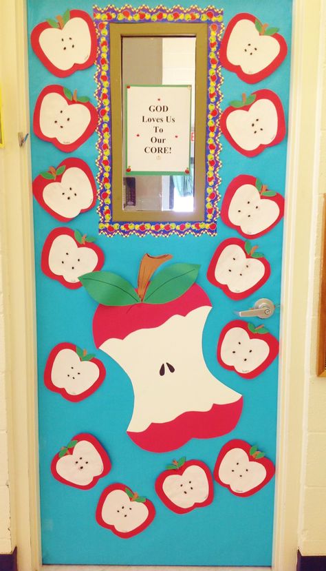 Fall Apple Door. Children made apples using construction paper and black beans… Apple Theme Classroom, Apple Bulletin Boards, Preschool Door, Apple Classroom, Apple Drawing, School Door Decorations, Poster Decoration, Preschool Bulletin, Apple Activities